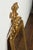 A French giltwood crested mirror from the early 20th century, with carved Music Allegory. Created in France during the...
