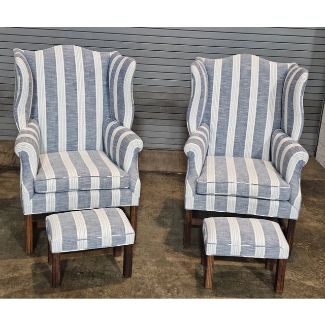 Store Item: Pair Mahogany Chippendale Style Wing Chairs w Matching Footstools Gray Fabric Description: Chairs feature...