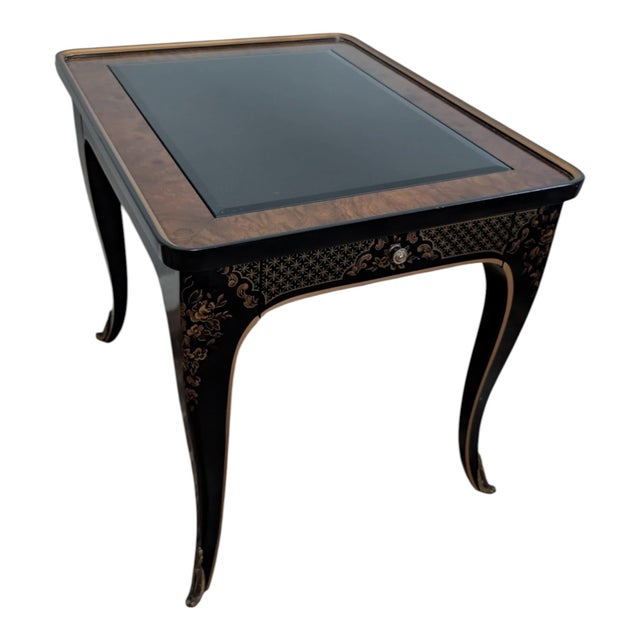 A striking vintage side table from Drexel’s Et Cetera collection, featuring a black lacquered finish with Chinoiserie-...