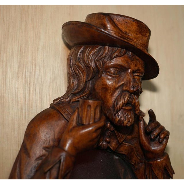 Super rare and highly collectable Black Forest Folk Art Wall mirror depicting the Jester with a Bee on his nose and the...