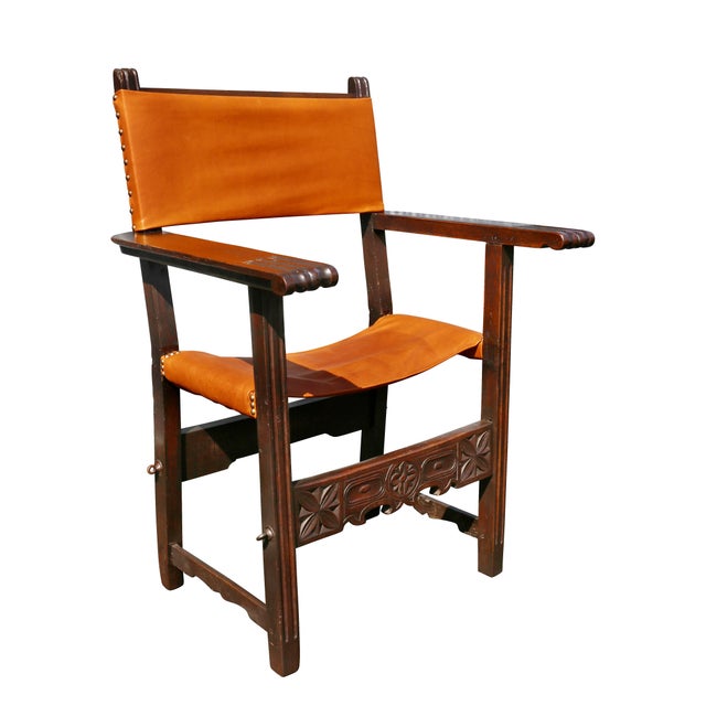 With new leather seat and back, flat arms and carved stretchers. Provenance; Fogg Estate, Chestnut Hill Ma.