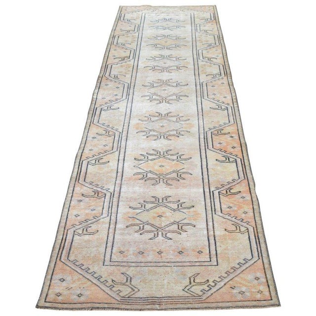 Hand-knotted with care using traditional rug-making techniques, this wool rug blends timeless craftsmanship with a modern...