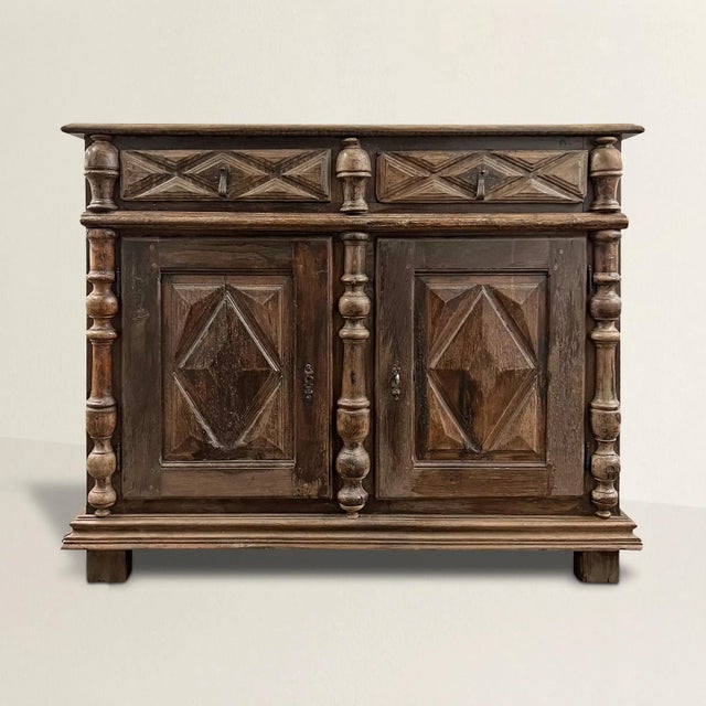 A remarkable rather large 17th century French Louis XIII oak chest from Normandy with two drawers with iron pulls over two...