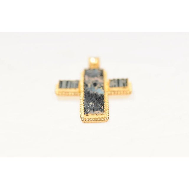 A Roman Empire Glass Cross set in 21K gold . This ancient Roman cross is set in 3.6 grams of 21 karat gold. This was...