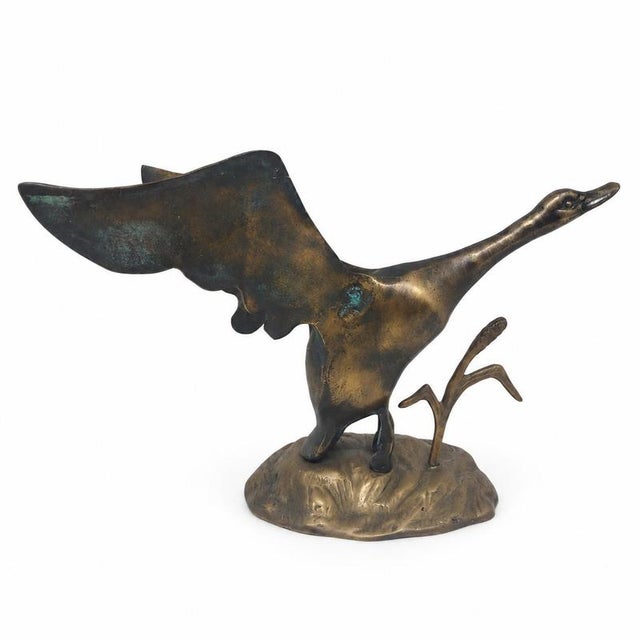 Goose in Flight Sculpture – Patinated Bronze – 20th Century. Object: Decorative sculpture of a wild goose in flight....