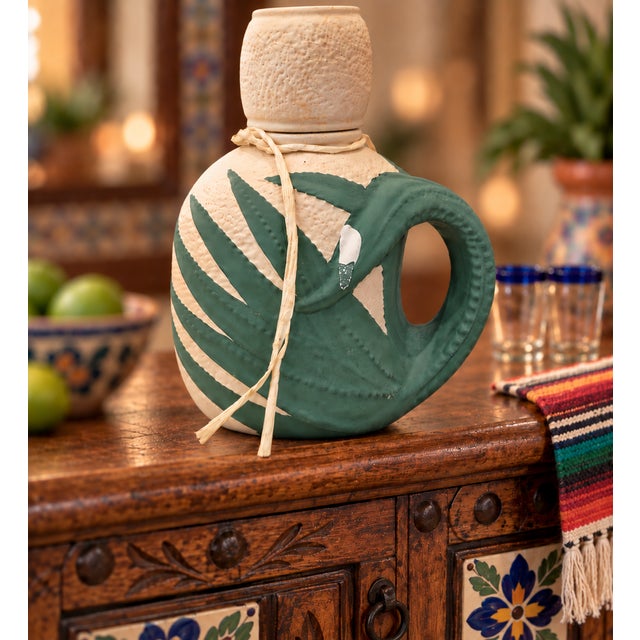 Distinctive vintage circa late 1990s Tenoch Reposado Tequila ceramic bottle from Mexico, featuring an unusual sculptural...