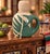 Distinctive vintage circa late 1990s Tenoch Reposado Tequila ceramic bottle from Mexico, featuring an unusual sculptural...