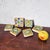 Set of six square glazed earthenware tiles with polychrome hand-painted underglaze decoration. This set features superb...