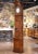 Towering at an impressive nine feet, this antique French longcase, or grandfather clock, was crafted in Lyon circa 1760...