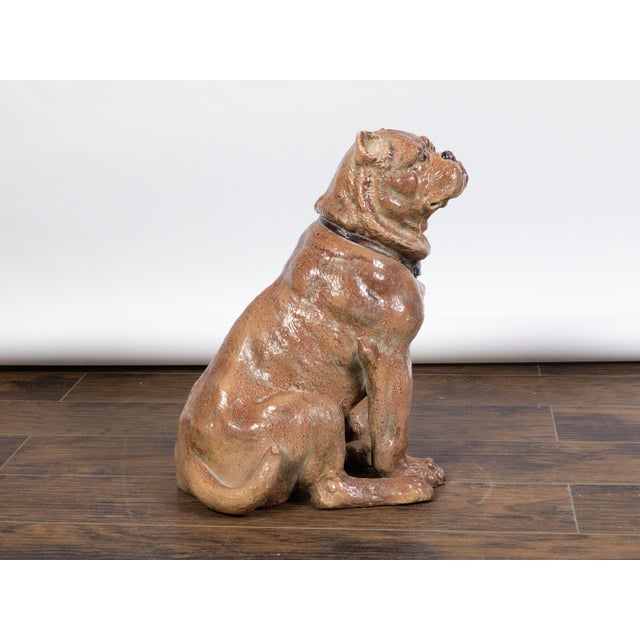 An English vintage pottery bulldog statue from the mid 20th century, with black collar. Created in England during the...