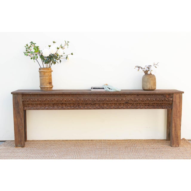 This Long architectural piece is a monumental 104-inch console that celebrates the raw power and intricate beauty of...