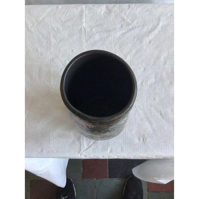 This unique 1960s Painted Ceramic Vase depicts object from a festival, celebration, fête, or even scenes from Mardi Gras/...