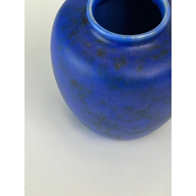 This small Chameleon Ware urn vase by George Clews & Co was produced in Staffordshire, England during the 1930s and...