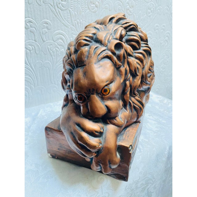 One of a kind vintage MCM large ceramic copper color lion figurine with glass eyes. A sweet piece to decorate your MCM...