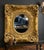 This is one impressive ornate frame with beveled oval mirror. Vibrant gold color.