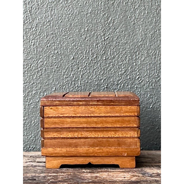 This vintage rustic solid wood storage box embodies the warmth and authenticity of handcrafted utilitarian design....