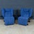 A striking pair of reclining armchairs crafted in italy during the 1980s, upholstered in vibrant blue alcantara leather....