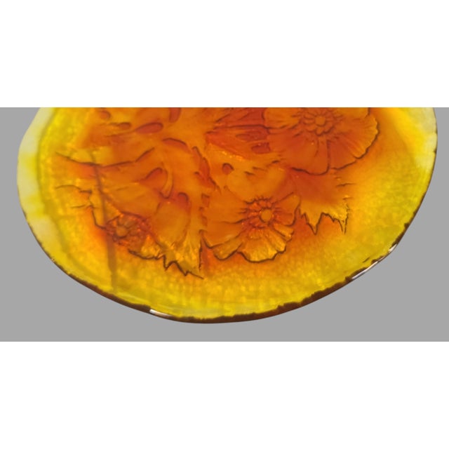 This vintage Amberina glass plate showcases an elegant raised floral thistle design, capturing the essence of timeless...