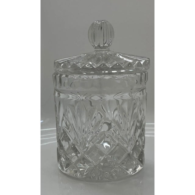 Pretty glass biscuit jar with lid. Perfect for candy, or on your vanity. Not chips or cracks. Stands 5.5 inches tall and...