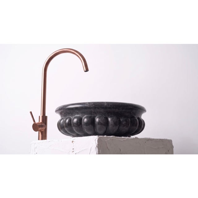 Introducing our Black Marble Scalloped Vessel Sink — a bold, sculptural centerpiece for any bathroom or powder room that...