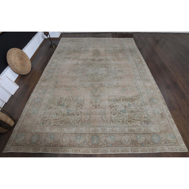 Vintage Persian Hand-Knotted area rug is a semi-antique vintage area rug. The '70s Eastern region of Anatolian's unique...