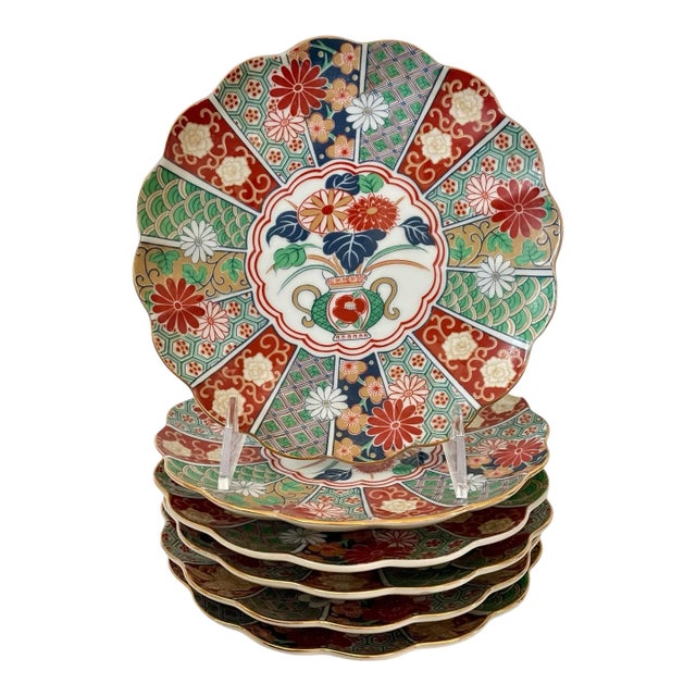 This set of 5 Arita Imari fan-shaped salad lunch plates features a scalloped design and vibrant multicolor porcelain...