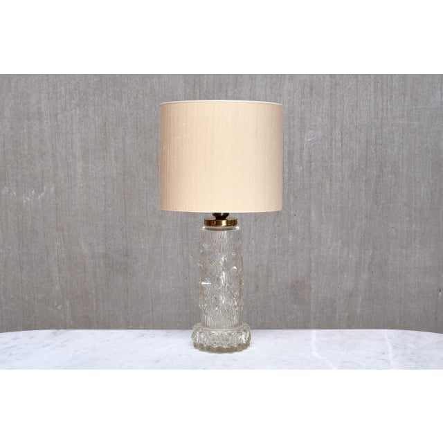 This very rare, generously sized table lamp was designed by henrik blomqvist and produced by stilarmatur tranås in sweden...