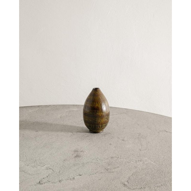 Rare and early Swedish mid century decorative stoneware ceramic brown vase with a yellow decorative decor by Arthur...