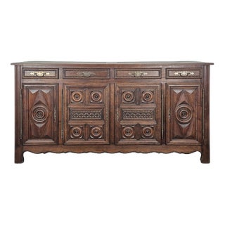 Low Sideboard with Four Doors in Oak Carved with Rosettes For Sale