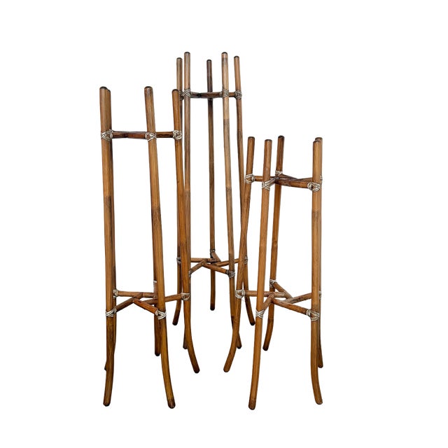 This is an iconic set of three McGuire plant stands crafted from the company's signature leather-wrapped bamboo. Dating to...