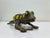 A very attractive old-style garden light -candle holder. It is a crawling frog made of cast iron with bubble glass in...