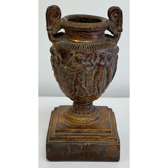Vintage Neo-Classical style bronzed urn depicting a Bacchic procession in the manner of the famed Townley Vase from 2nd C...