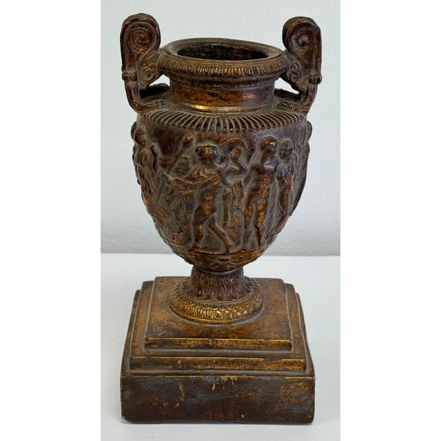 Vintage Neo-Classical style bronzed urn depicting a Bacchic procession in the manner of the famed Townley Vase from 2nd C...