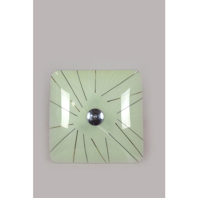 A stunning set of six vintage Czech glass pendant lamps from the 1960s–70s. Each lamp features a unique geometric design...