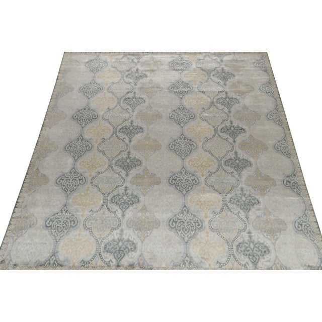 An 8x10 rug inspired from traditional rug styles, from Rug & Kilim’s Modern Classics Collection. Hand-knotted in wool,...