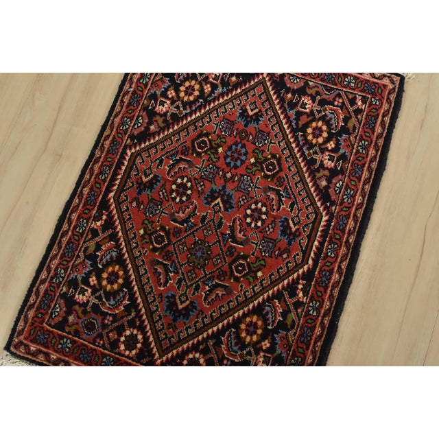 An authentic vintage traditional Bidjar rug hand-knotted with fine wool and natural dyes. This intricately woven oriental...