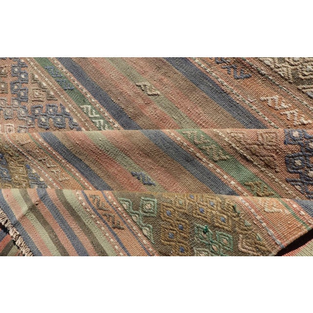 Mid 20th Century Mid 20th Century Vintage Striped Turkish Kilim Rug With Geometric Shapes and Soft Muted Colors For Sale - Image 10 of 12