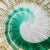 Beautiful vintage Murano hand blown emerald green, with gold flecks Italian art glass bowl. The bowl has a painterly...