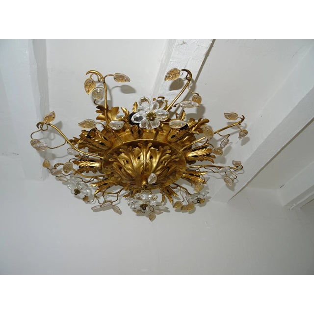 Housing 15 lights. This has been newly rewired with certified UL US sockets for the USA and ready to hang. Gold tole with...