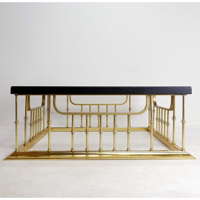 Large square coffee table in “fireplace fender” style - 1960s/70s In the style of Erwin Lambeth Hollywood Regency...