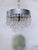 This exceptional vintage chandelier is an absolute ice-box of shimmering brilliance, perfectly capturing the crisp, high-...