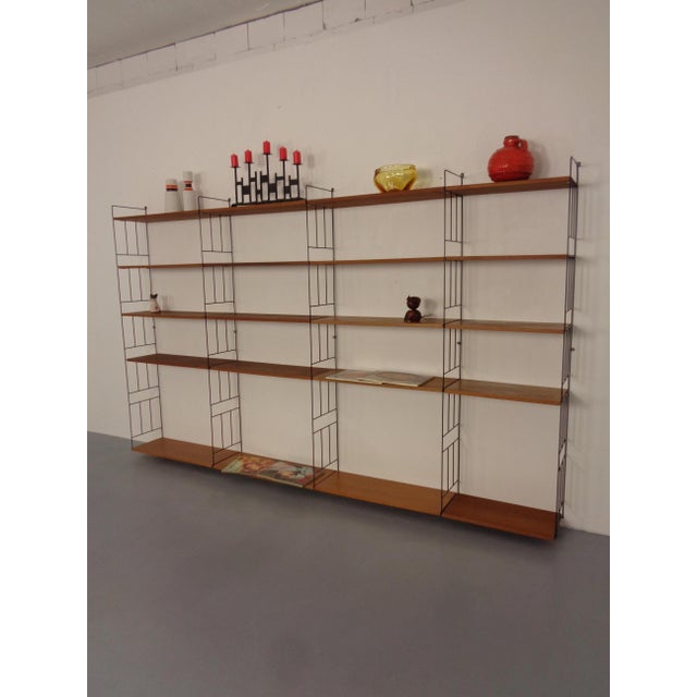 Large WHB shelving system from the 1960s. Consisting of 5 shelves (50 cm wide, 26 cm deep) 15 shelves (71 cm wide, 26 cm...
