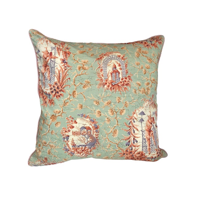 This pillow features a vintage-inspired, chinoiserie-style fabric with intricate patterns and motifs, including whimsical...