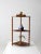 This is an antique folk art spool shelf. Wooden sewing spools decorate and form the framing of this hand-crafted tabletop...