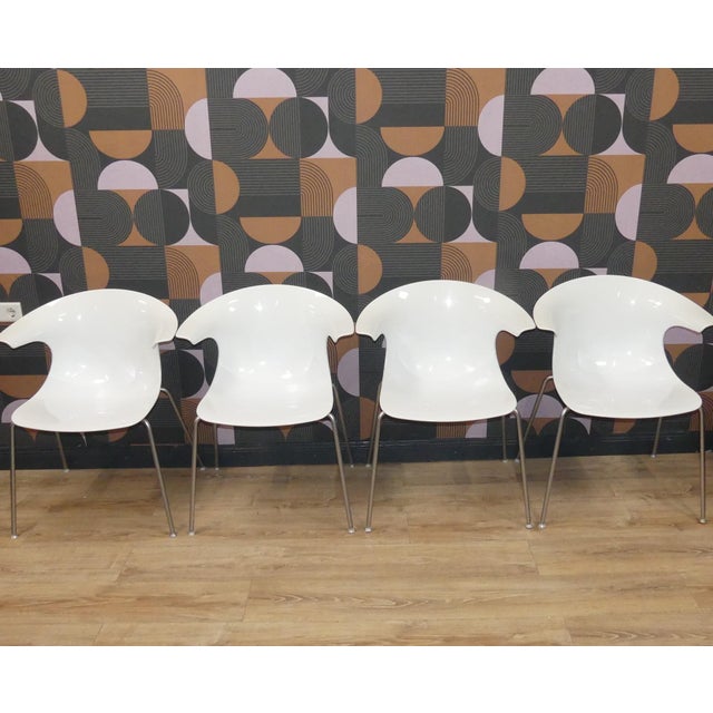 Fantastic set of 4 The stacking chair has been a classic for decades. Iconic examples include the EUROPA model by Helmut...