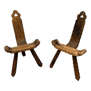 Pair of low three-legged brutalist chairs. French work. Circa 1950 For Sale