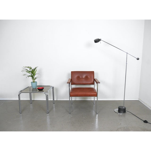 Adjustable floor lamp from the German manufacturer Sölken, dating from the 1970s. The chrome-plated metal frame with...