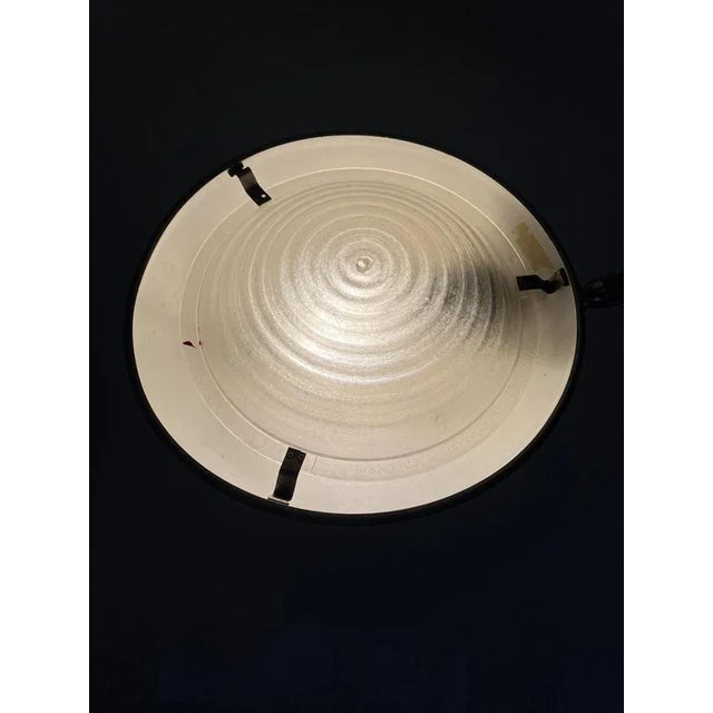 A clamping lamp *by ferdinand solere *france 1950s *in industry look *swivel and tiltable *with a hammer stroke interface...