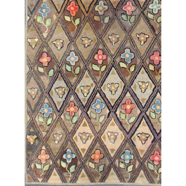 Measures: 4'10 x 8'6 Antique American Hooked Rug with Diamond Patchwork Floral Design Antique American Hooked Rug with...