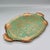 A classic vintage Florentine tray in turquoise and gold, with an ornate hand-painted scroll and floral motif across the...